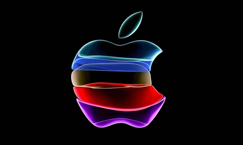 Görselde siyah bir arka plan üzerinde mavi, yeşil, sarı, kırmızı ve mor renklerde katmanlı, yarı saydam şeritlerden oluşan parlayan bir Apple logosu görülüyor.